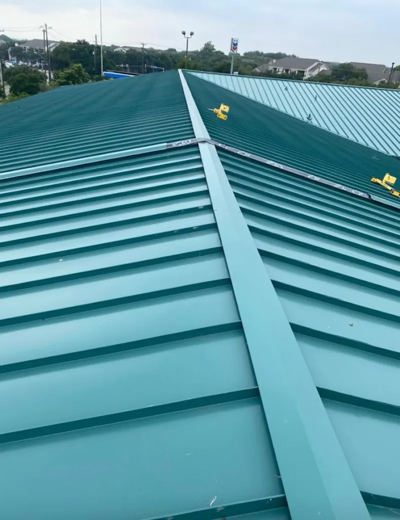 Green commercial metal roof ridge and valley for Metal Roof Repair in Upper Nazareth